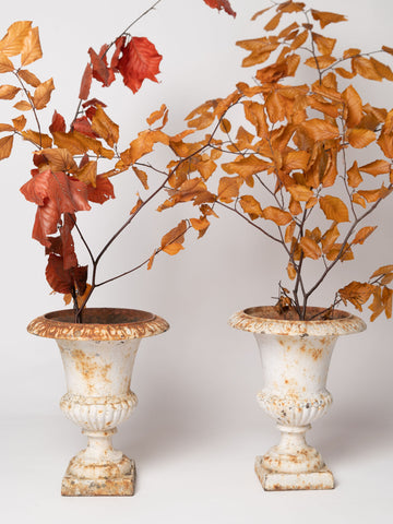 Pair small antique french cast iron urns with original paint