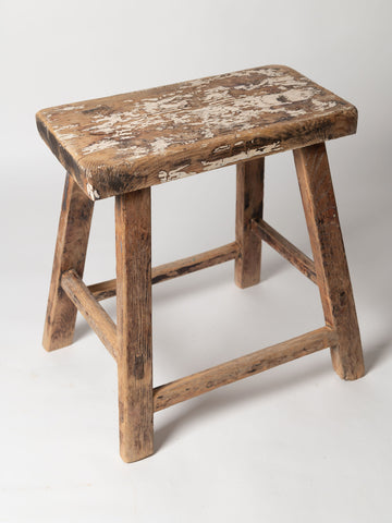 Vintage Chinese elm stool with traces of paint to the seat