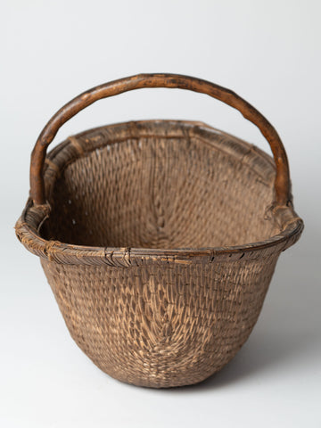 Antique chinese hand woven basket with bamboo handle