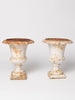 Pair small antique french cast iron urns with original paint