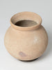 Vintage terracotta water carrying pot on stand