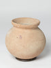Vintage terracotta water carrying pot on stand