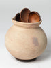 Vintage terracotta water carrying pot on stand