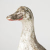 Vintage garden stone duck with old paint