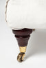 Vintage upholstered ottoman footstool on castors