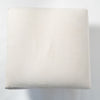 Vintage upholstered ottoman footstool on castors