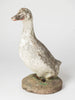 Vintage garden stone duck with old paint