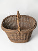 Vintage French handwoven straw basket