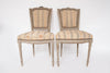 Pair Antique French Painted Chairs with bow garland crest