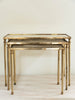 Mid Century French Brass Nesting tables with Verre eglomise tops