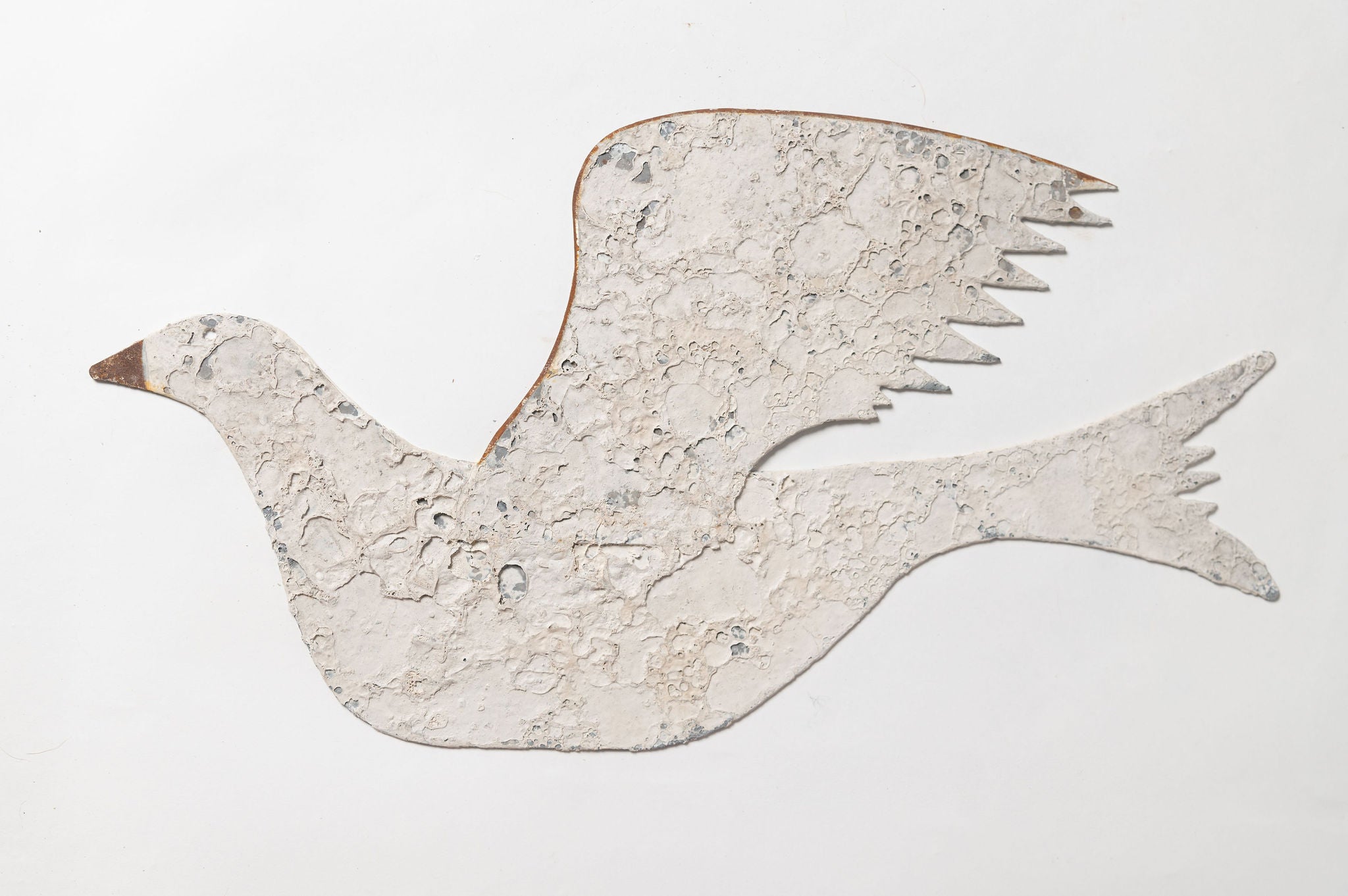 Handcrafted metal shaker style dove