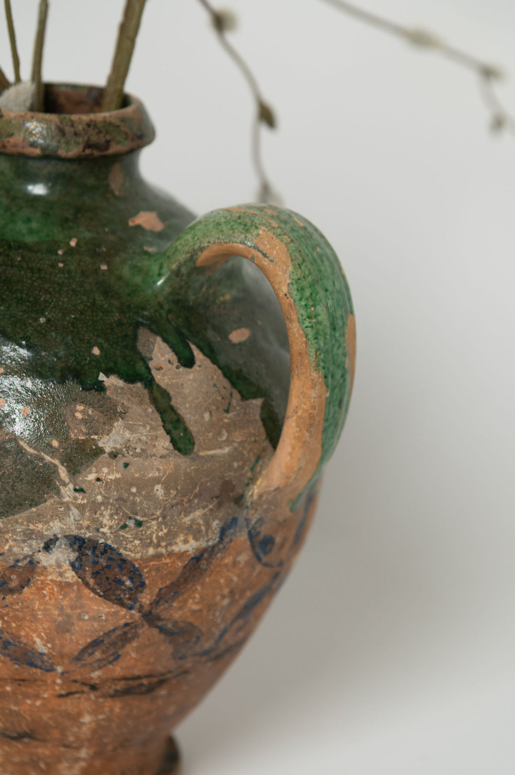 Antique French Provencal oil terracotta jug with green glaze and hand painted decorations