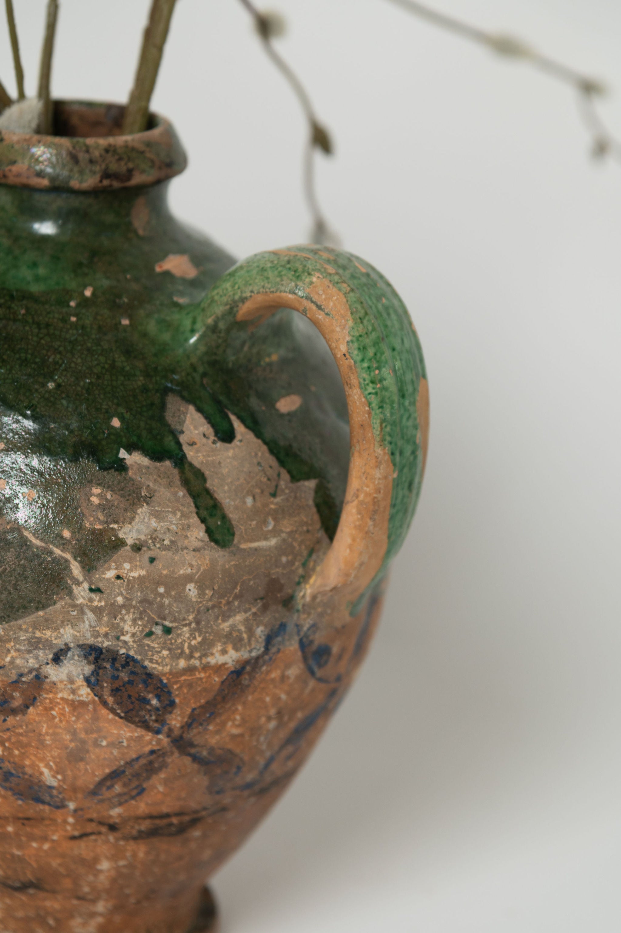 Antique French Provencal oil terracotta jug with green glaze and hand painted decorations