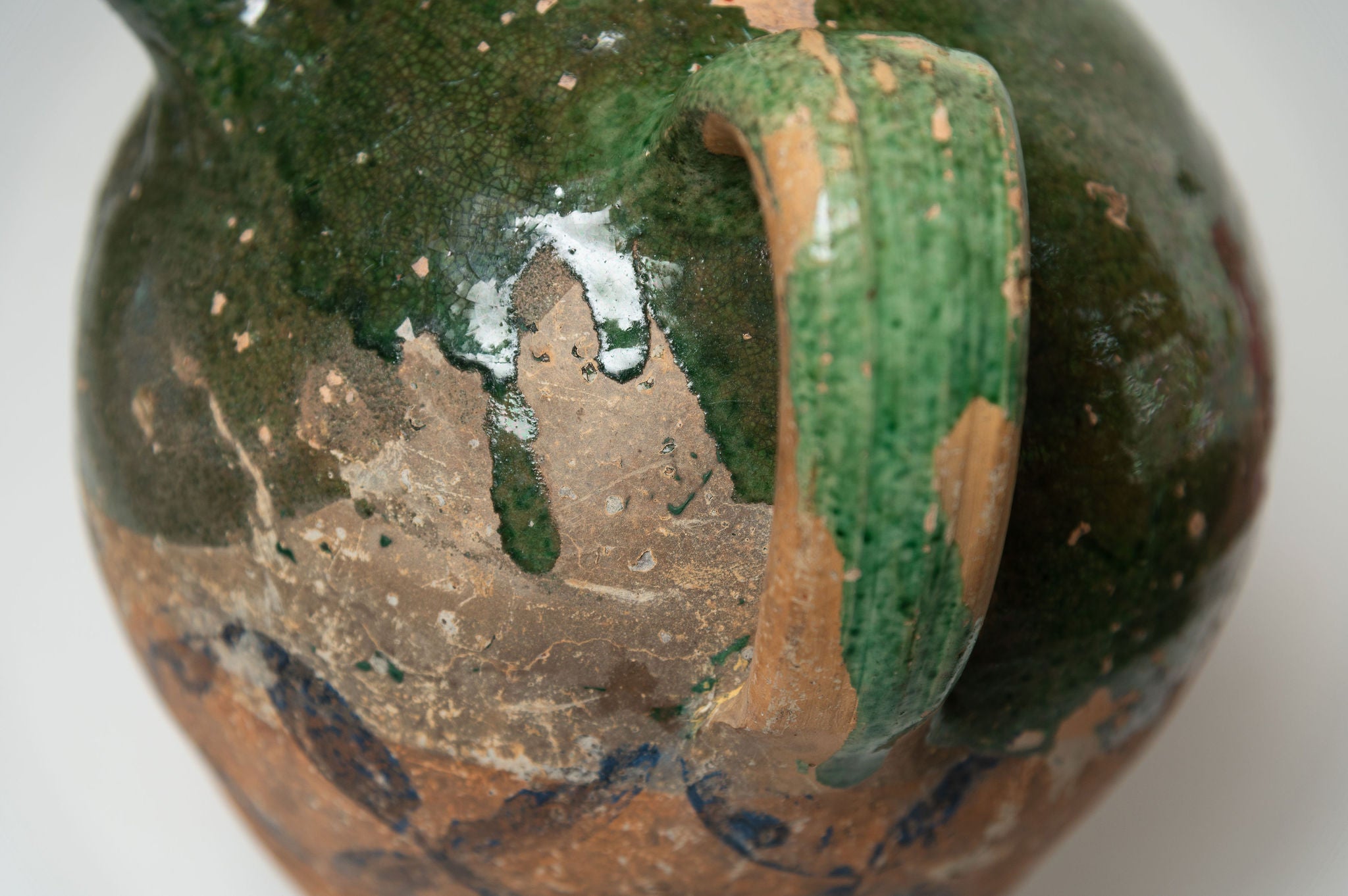 Antique French Provencal oil terracotta jug with green glaze and hand painted decorations