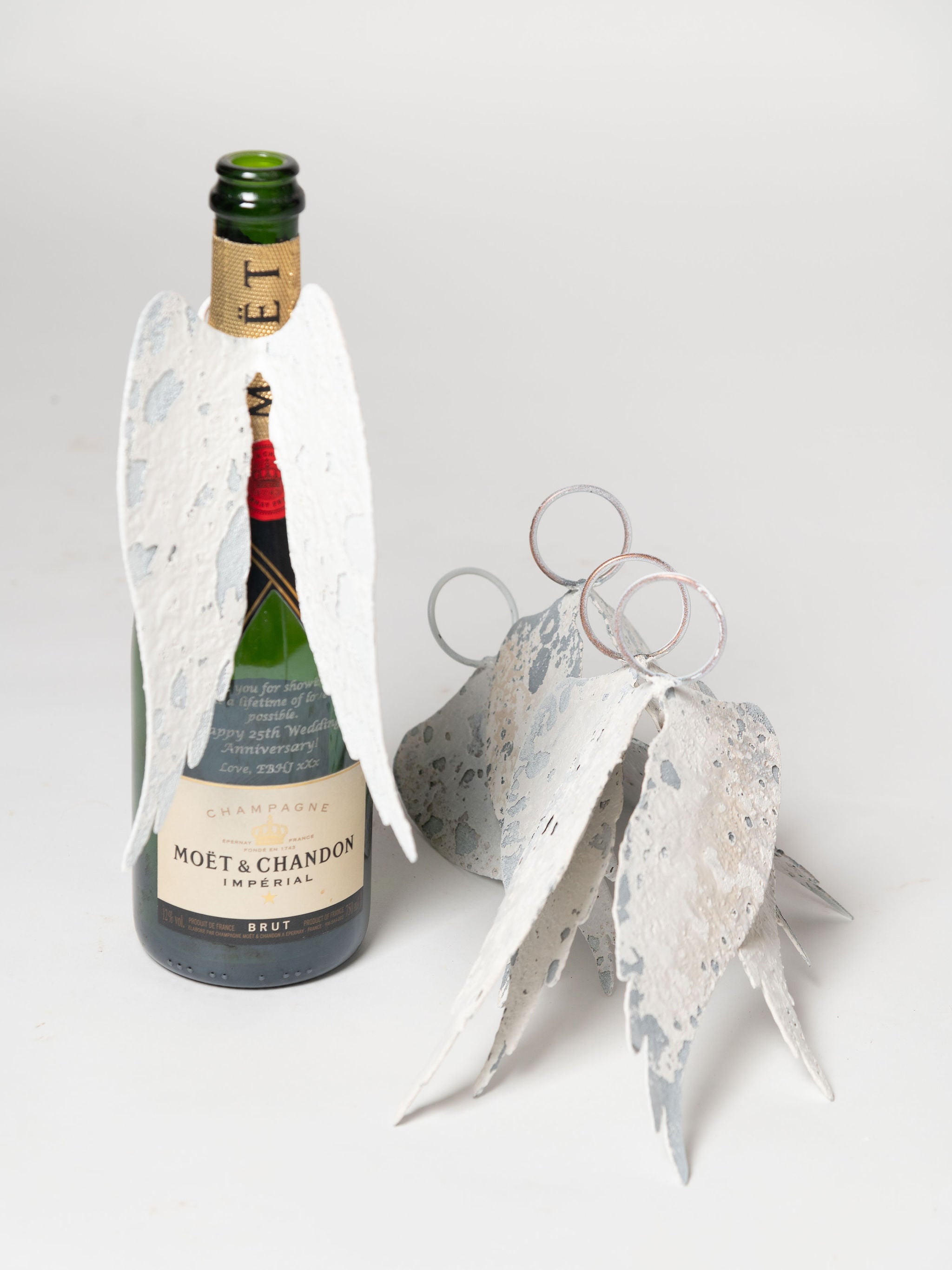 Hand crafted aged metal angel wings for bottles