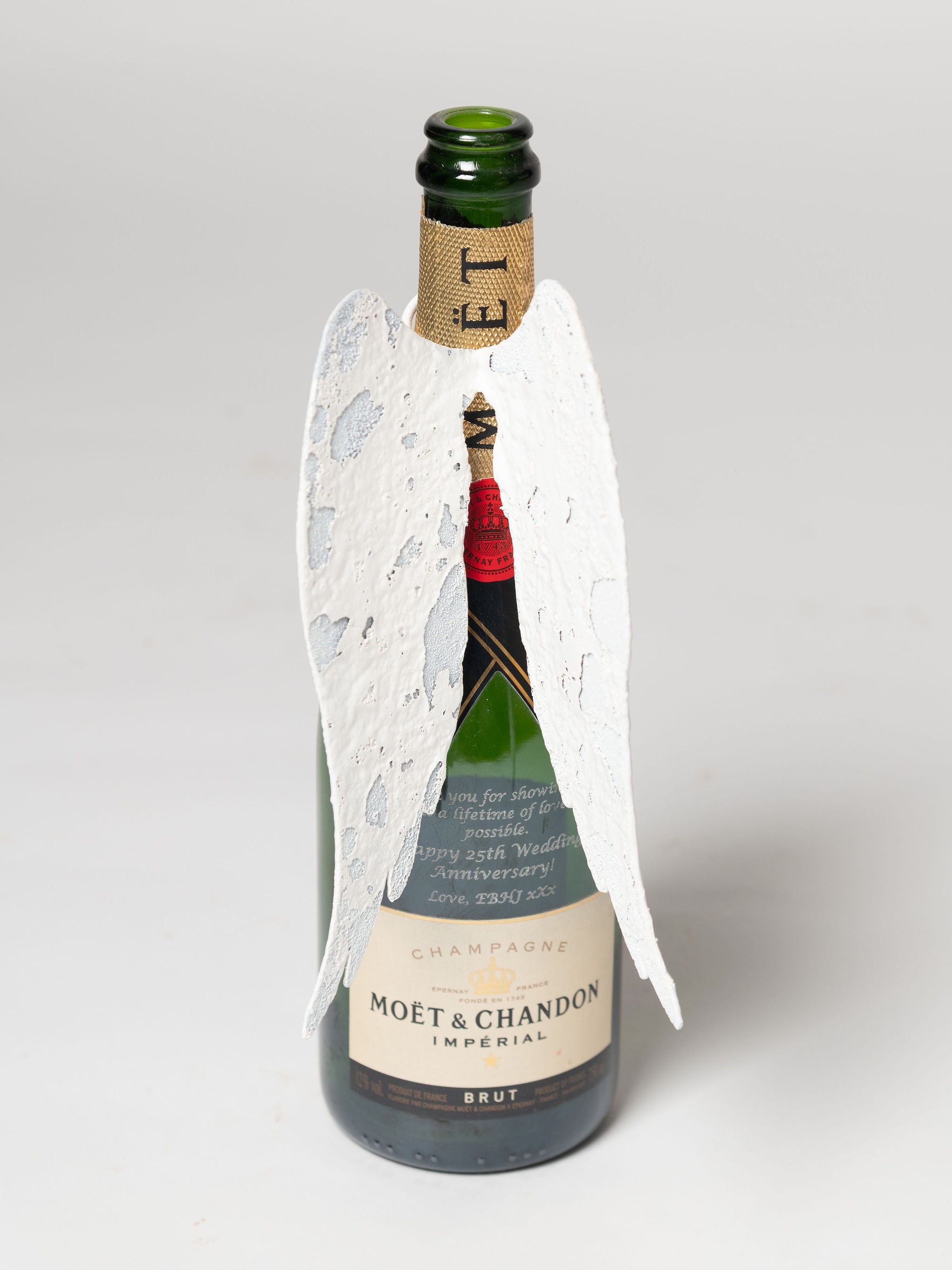 Hand crafted aged metal angel wings for bottles