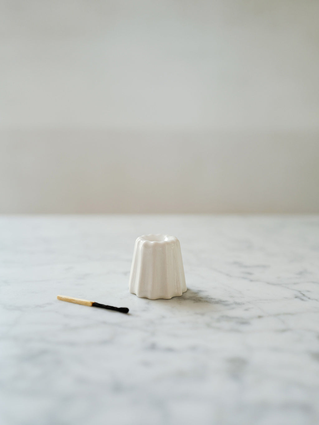 Ovo things Porcelain canele candle holder