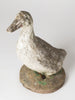 Vintage garden stone duck with old paint
