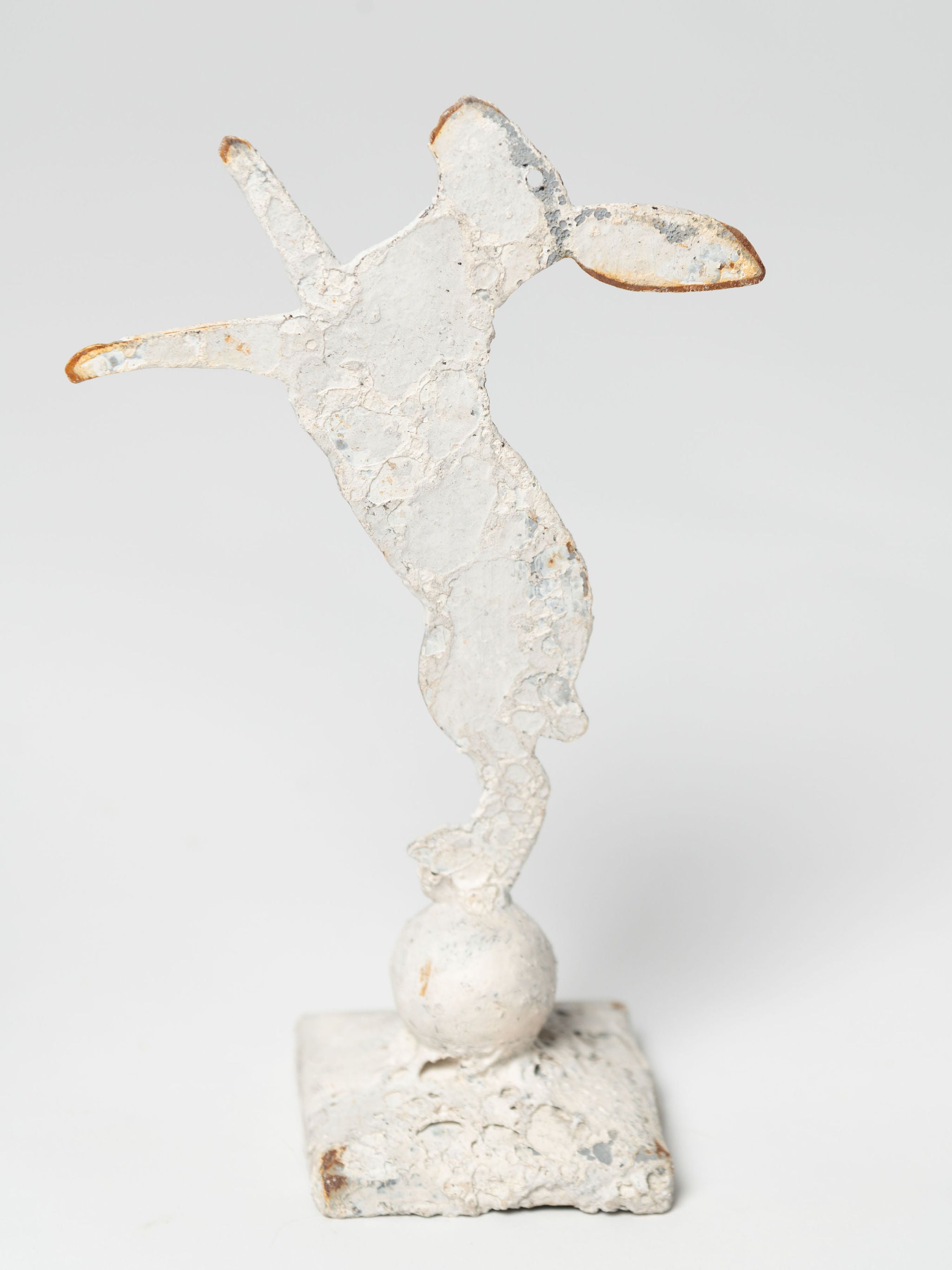 Handcrafted miniature metal boxing hares on stands