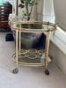 Mid Century French small oval drinks trolley